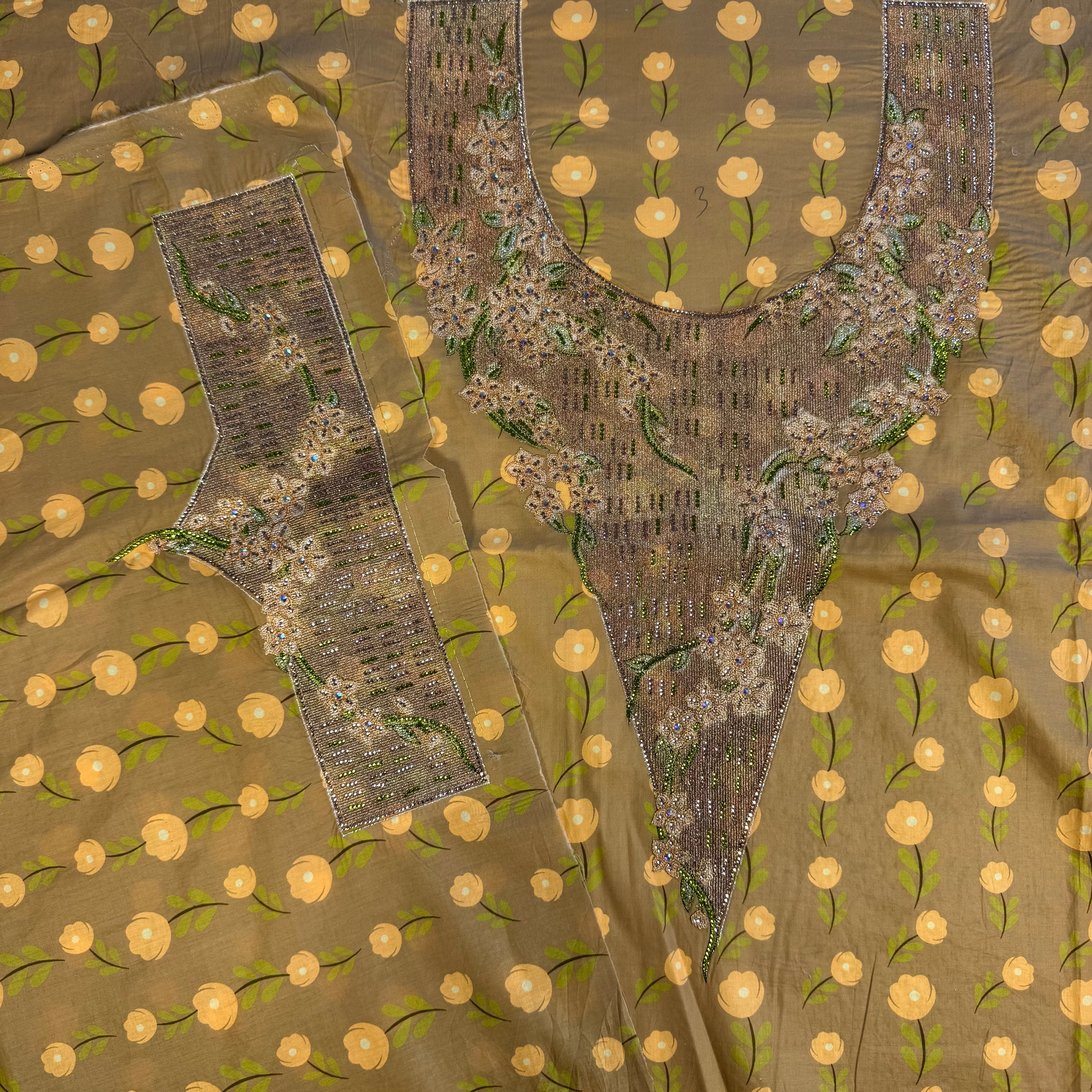 Laser-cut abaya with stone embellishments and printed design