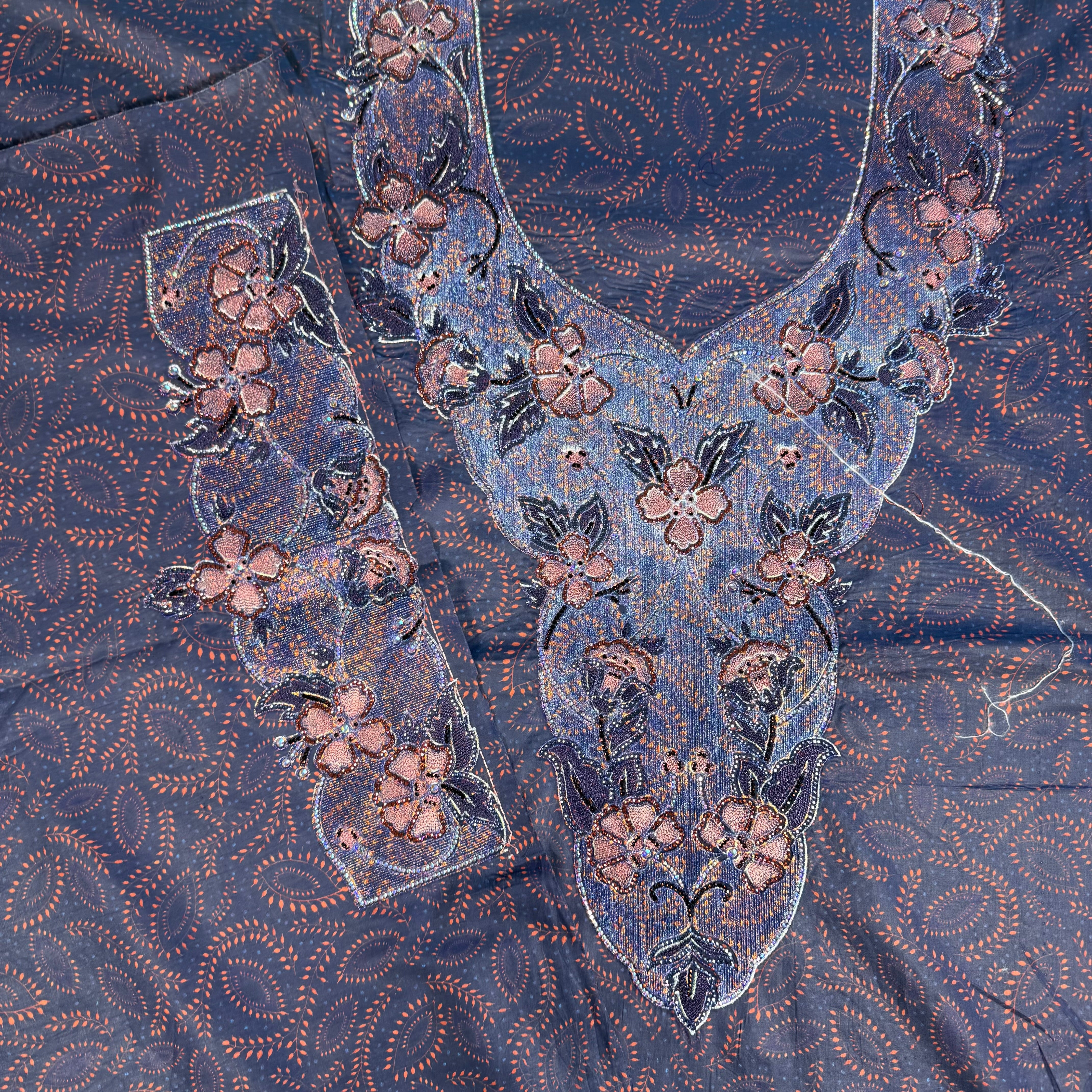 Laser-cut abaya with beaded print