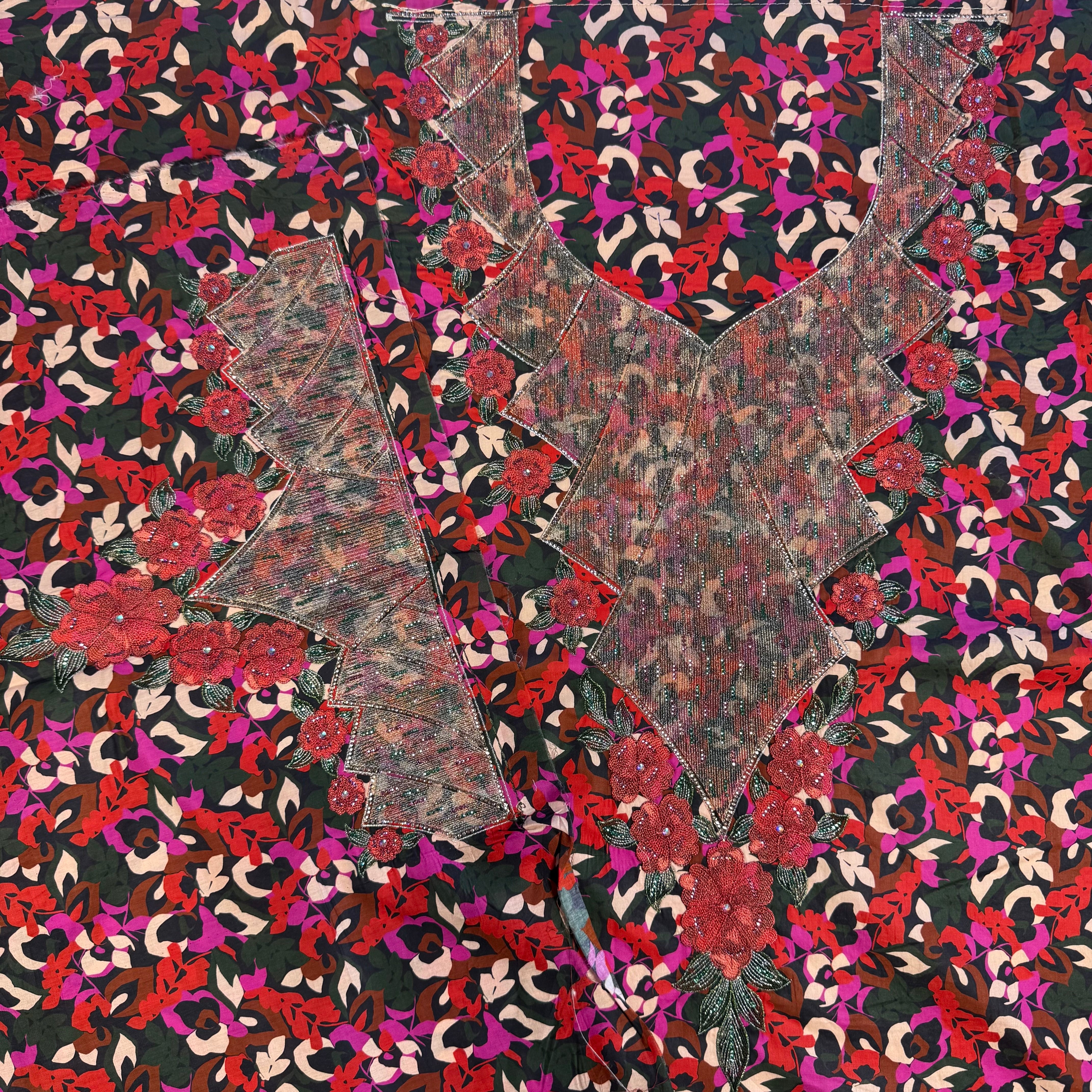 Laser-cut thobe with printed gemstone designs