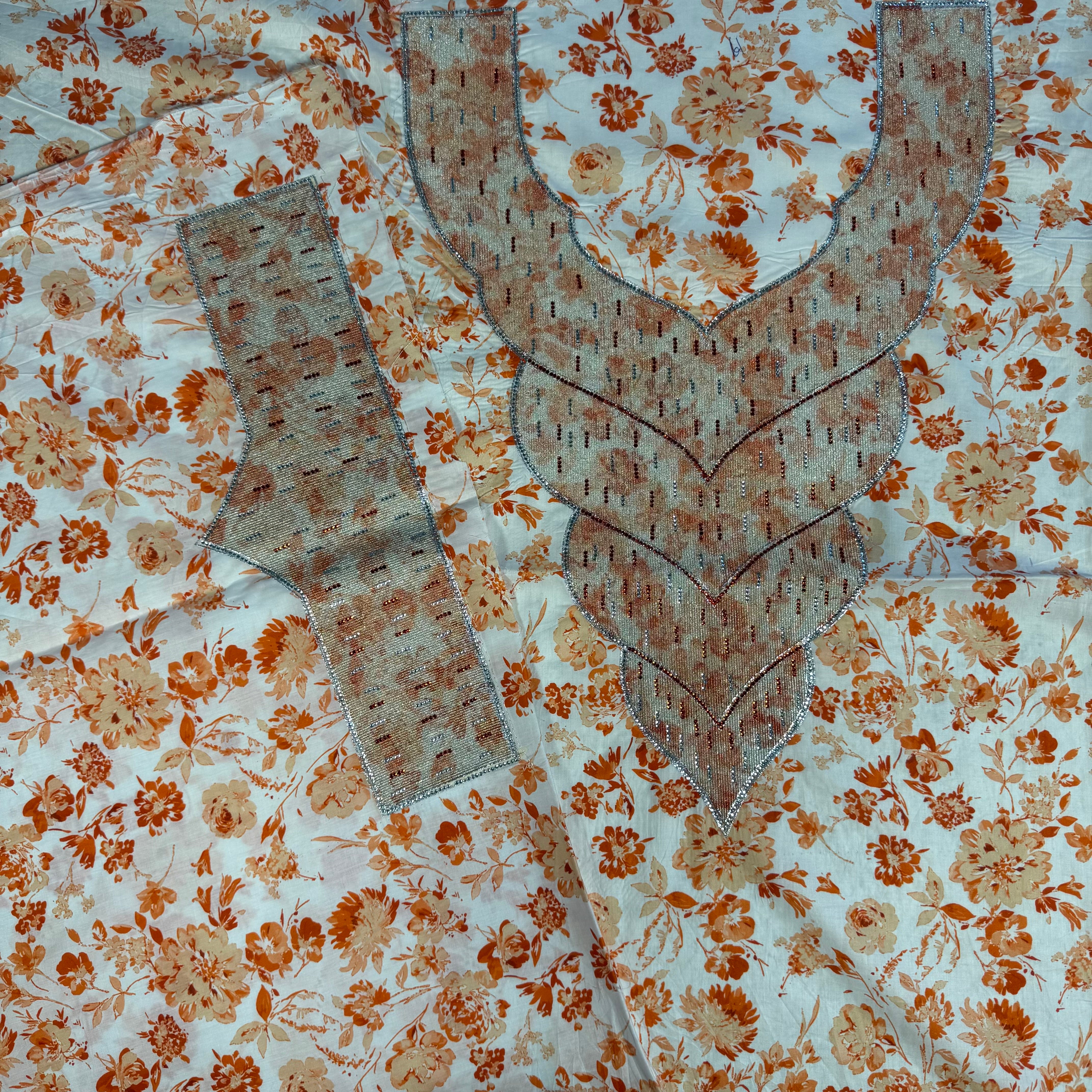 Laser-embroidered dress with gemstone prints