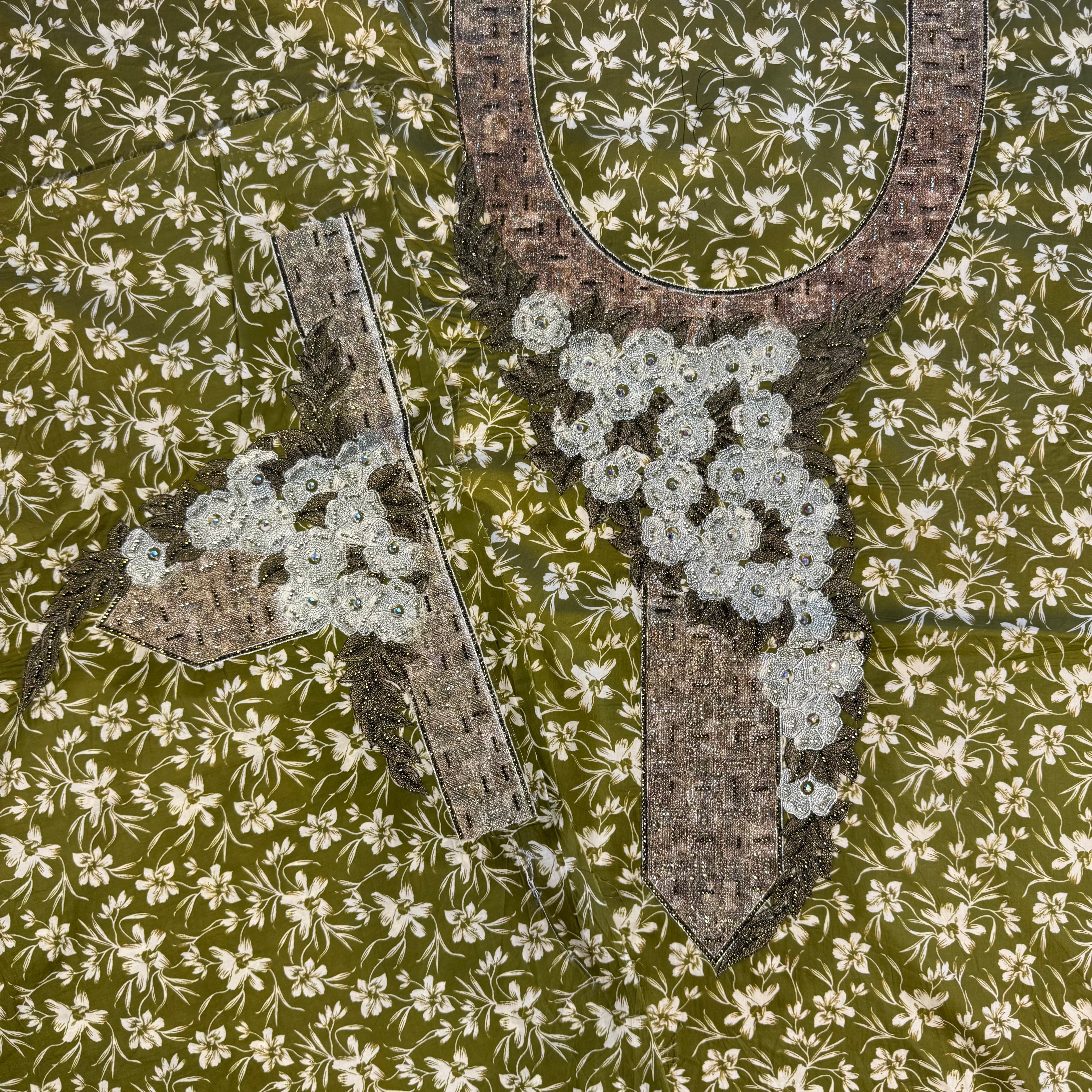 Laser-cut abaya with stone embellishments and print