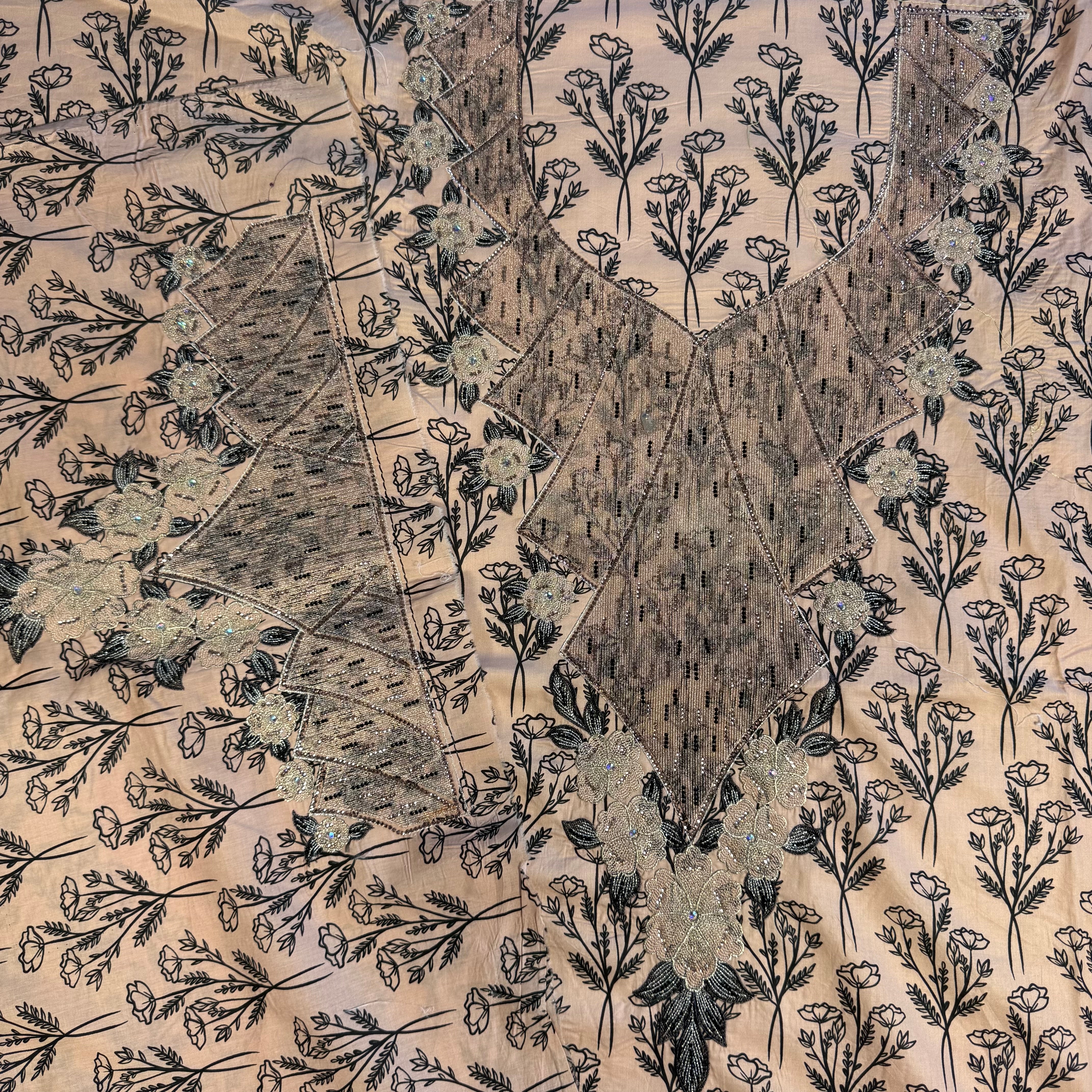 Embroidered laser-cut dress with bead and print details