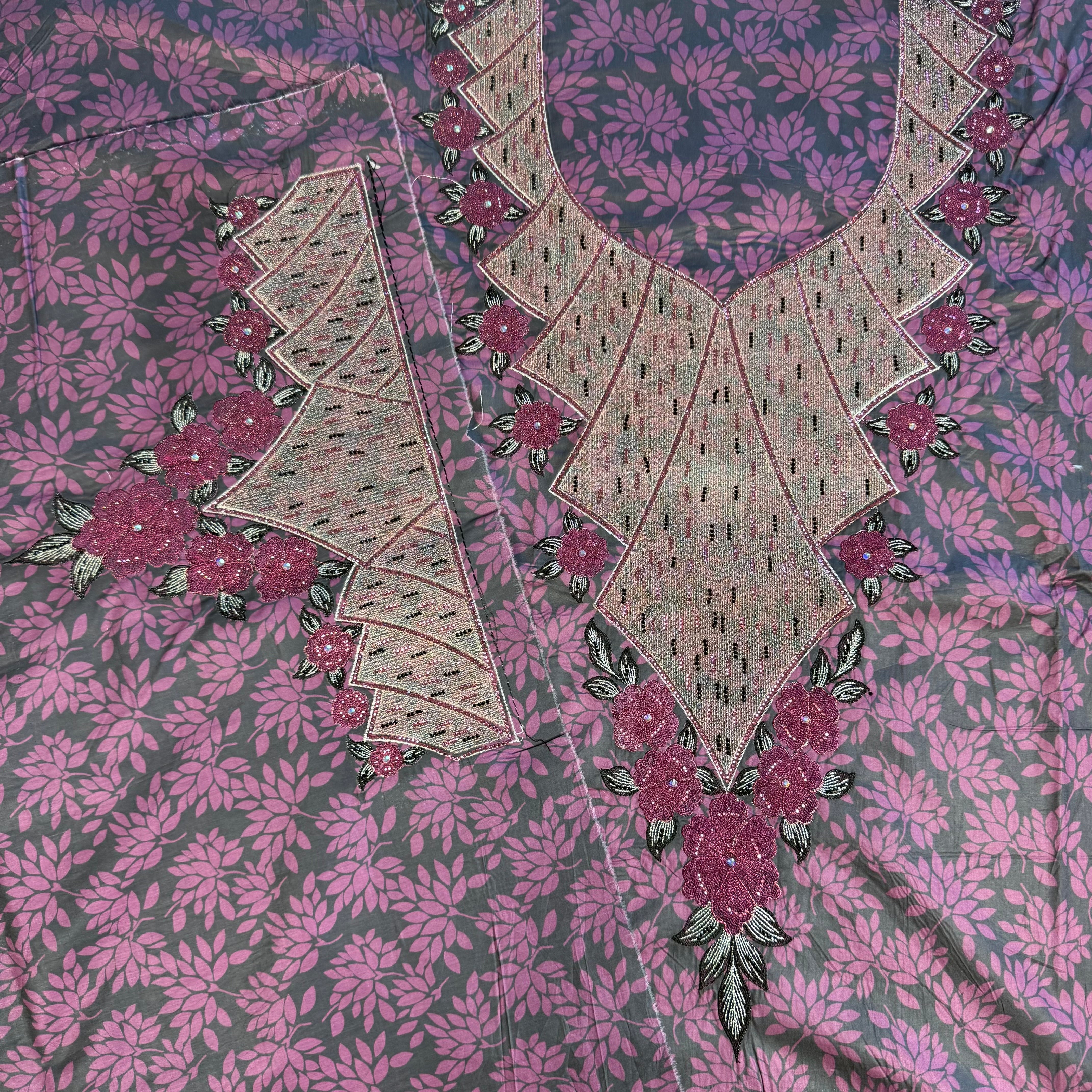 Embroidered laser-cut dress with gemstone accents and print