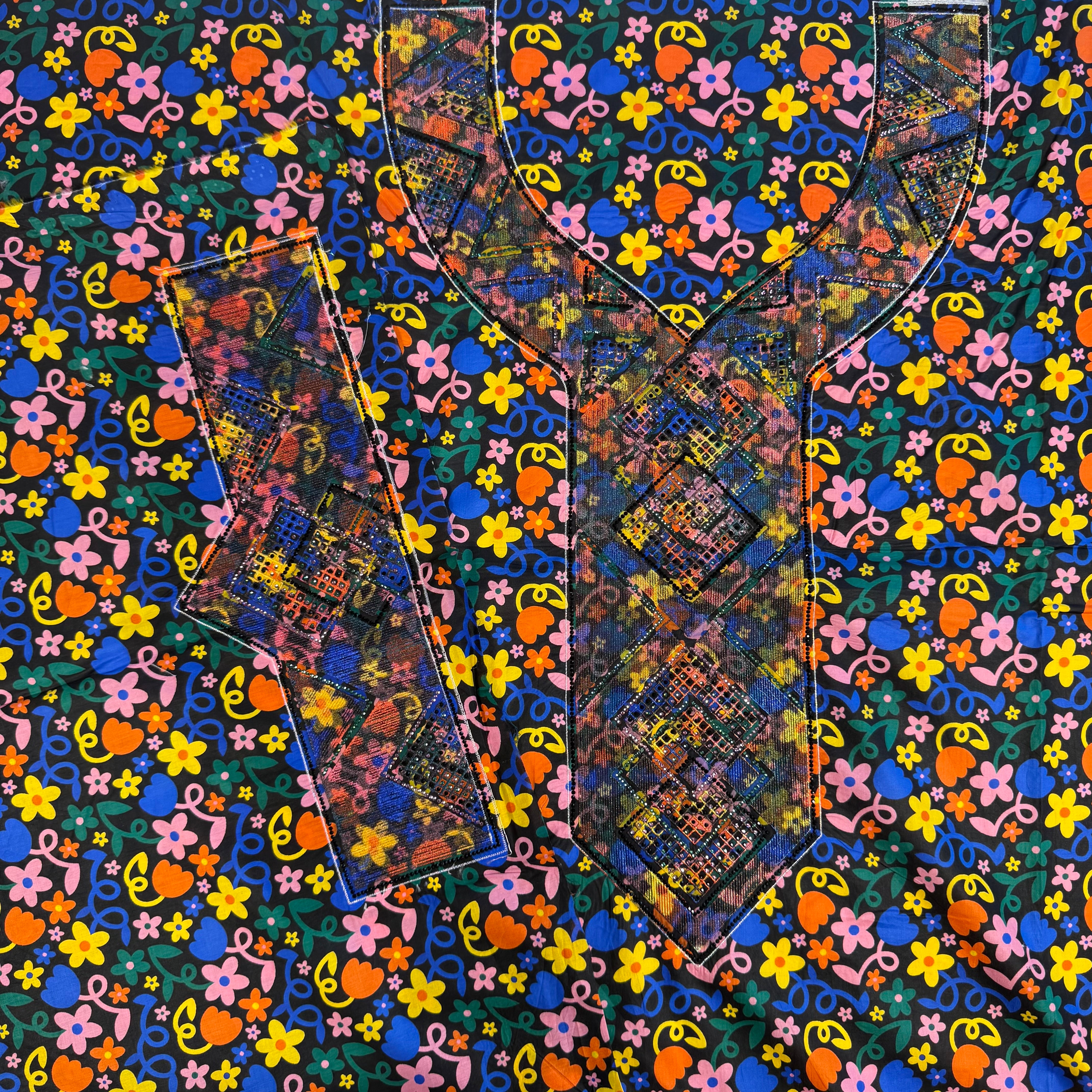 Laser-cut thobe with printed beading