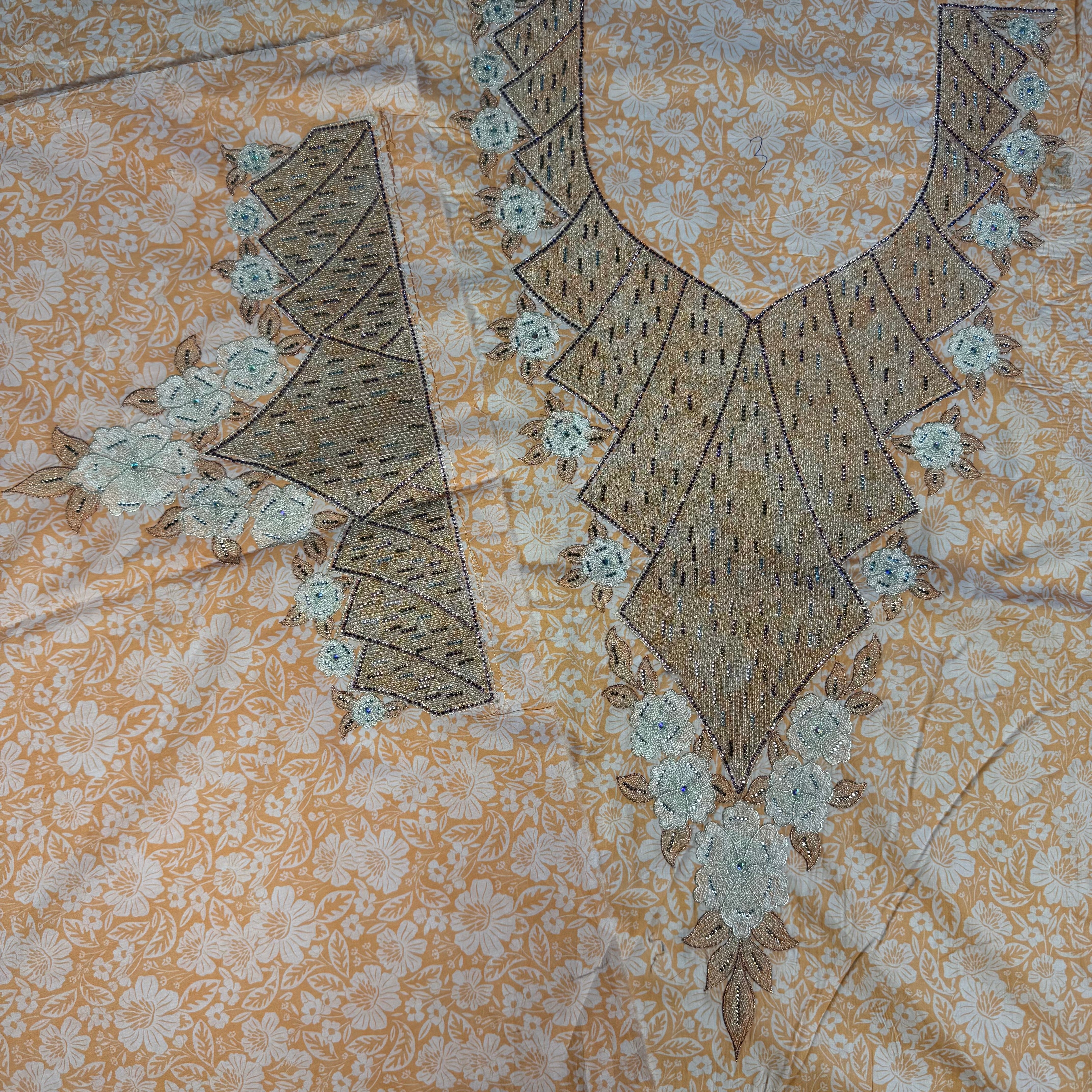 Laser-cut abaya with stone embellishments and print