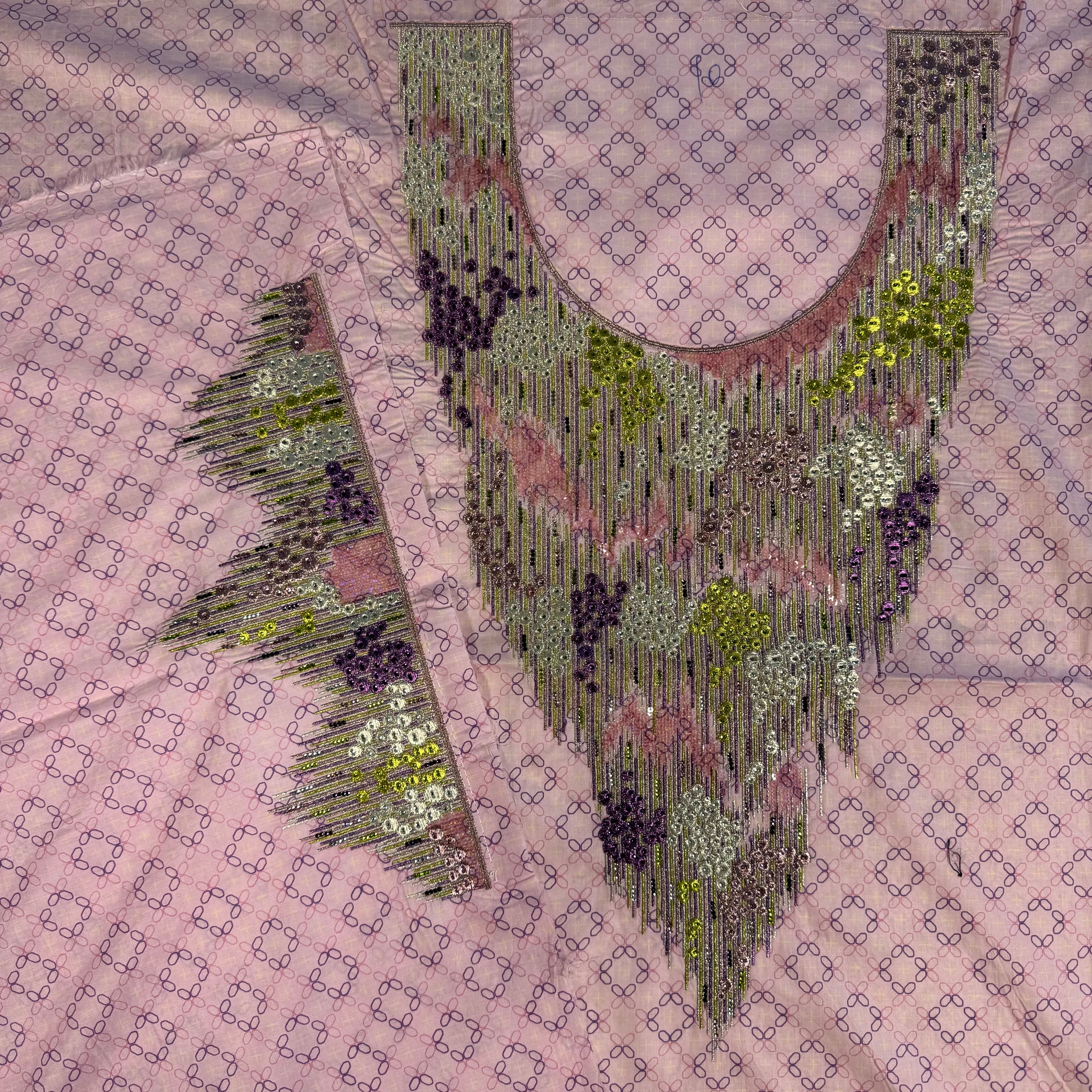 Laser-cut dress with beaded print