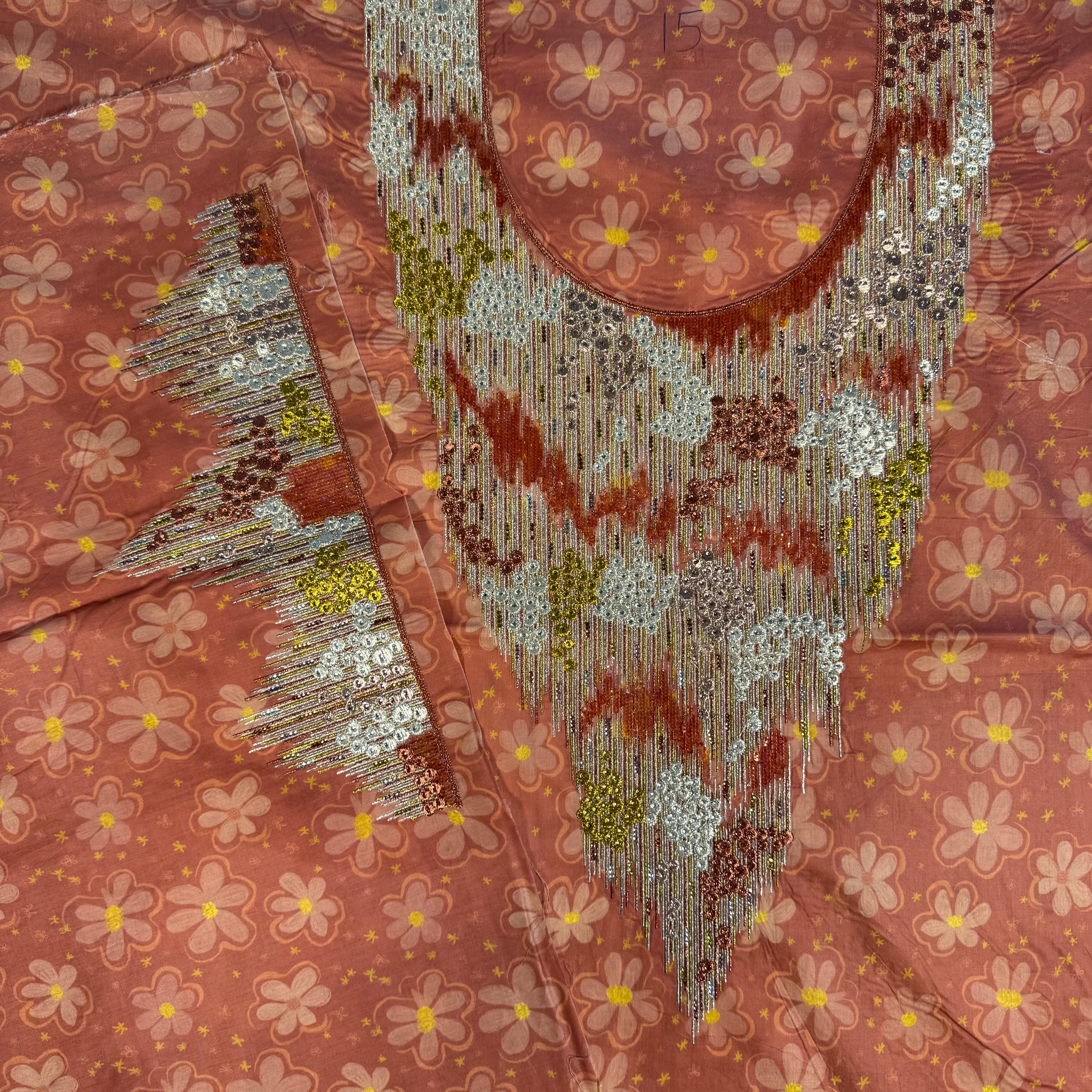 Laser-cut thobe with stud prints